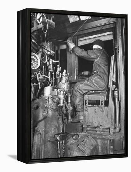 A View of a Santa Fe Railroad Freight Train Conductor Pulling the Whistle Cord-Bernard Hoffman-Framed Premier Image Canvas