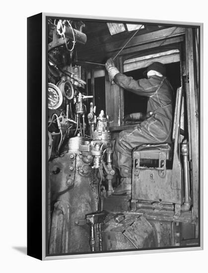 A View of a Santa Fe Railroad Freight Train Conductor Pulling the Whistle Cord-Bernard Hoffman-Framed Premier Image Canvas