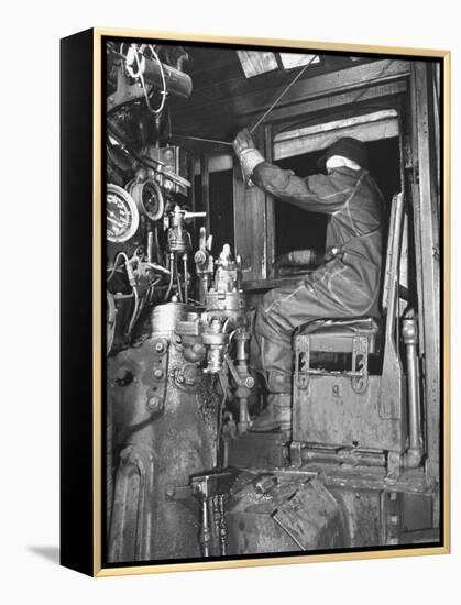 A View of a Santa Fe Railroad Freight Train Conductor Pulling the Whistle Cord-Bernard Hoffman-Framed Premier Image Canvas