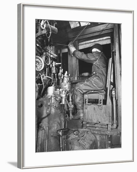 A View of a Santa Fe Railroad Freight Train Conductor Pulling the Whistle Cord-Bernard Hoffman-Framed Premium Photographic Print