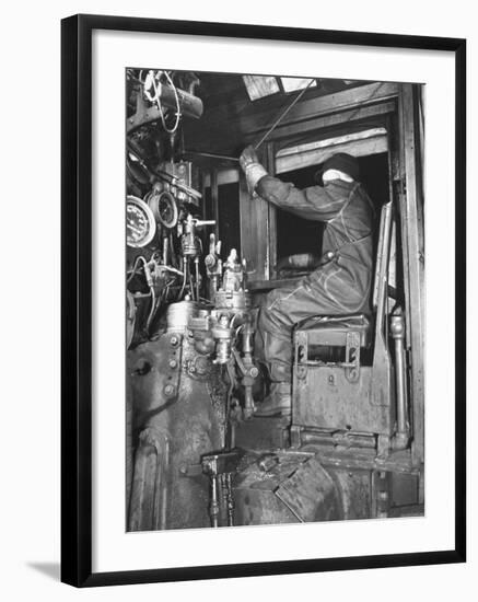 A View of a Santa Fe Railroad Freight Train Conductor Pulling the Whistle Cord-Bernard Hoffman-Framed Premium Photographic Print