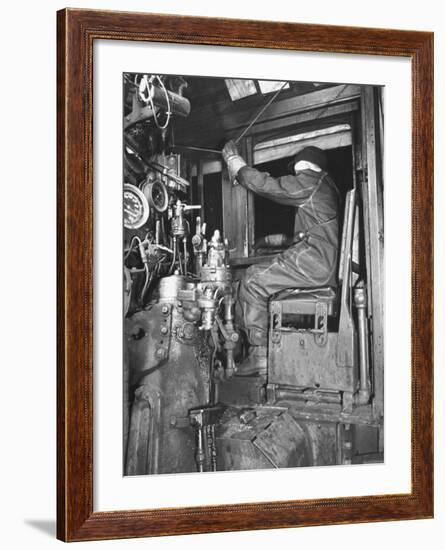 A View of a Santa Fe Railroad Freight Train Conductor Pulling the Whistle Cord-Bernard Hoffman-Framed Premium Photographic Print