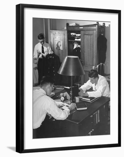 A View of Cadets at the Annapolis Naval Academy Studying in their Dorm Room-David Scherman-Framed Premium Photographic Print