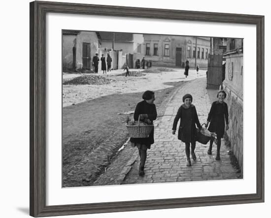 A View of Jewish Children Walking Through the Streets of their Ghetto-William Vandivert-Framed Premium Photographic Print