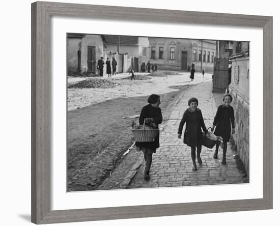 A View of Jewish Children Walking Through the Streets of their Ghetto-William Vandivert-Framed Premium Photographic Print