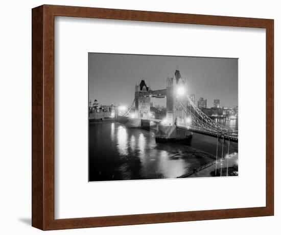 A View of Tower Bridge on the River Thames Illuminated at Night in London, April 1987-null-Framed Photographic Print