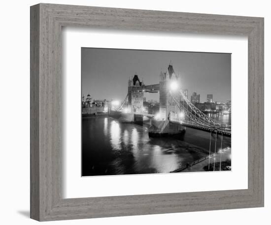 A View of Tower Bridge on the River Thames Illuminated at Night in London, April 1987-null-Framed Photographic Print