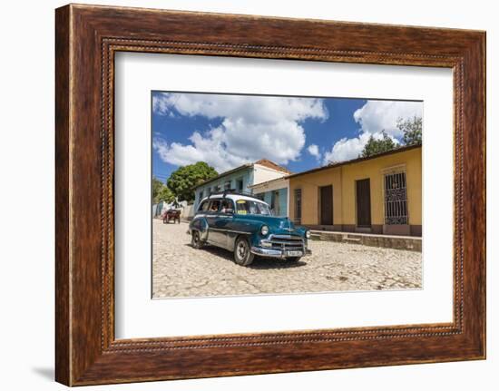 A vintage 1950's American car working as a taxi in the town of Trinidad, UNESCO World Heritage Site-Michael Nolan-Framed Photographic Print