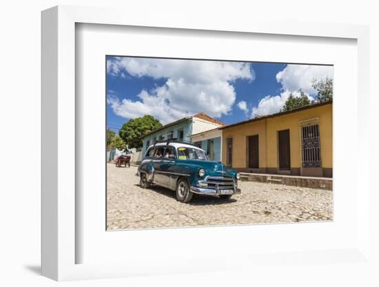 A vintage 1950's American car working as a taxi in the town of Trinidad, UNESCO World Heritage Site-Michael Nolan-Framed Photographic Print