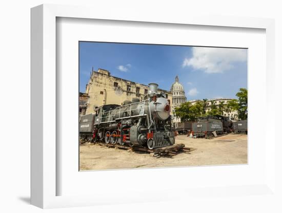 A Vintage Steam Train in a Restoration Yard with Dome of Former Parliament Building in Background-Sean Cooper-Framed Photographic Print