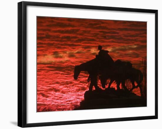 A Vivid Late-Autumn Sunset Silhouettes the Statue Known as Pioneer Mother at Penn Valley Park-null-Framed Photographic Print