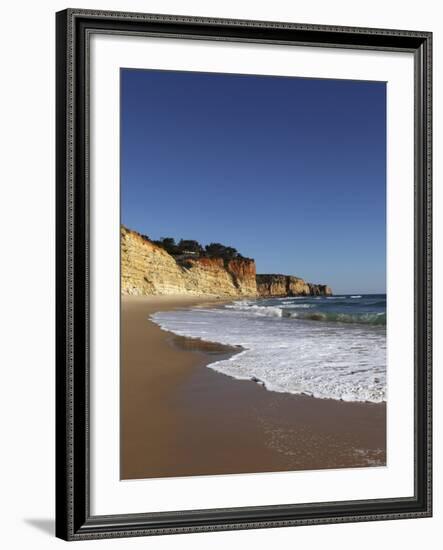 A Wave Breaks on Golden Sands Flanked by Steep Cliffs, Typical of the Atlantic Coastline Near Lagos-Stuart Forster-Framed Photographic Print