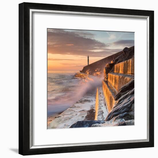 A Wave Rushes towards the Viewer along the Pier Wall at Sunset in Aberystwyth, West Wales, Uk. the-Izzy Standbridge-Framed Photographic Print