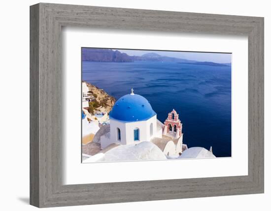 A white church with blue dome overlooking the Aegean Sea, Santorini, Cyclades-Ed Hasler-Framed Photographic Print