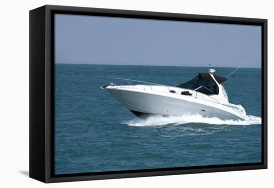 A White Speedboat at the Height of Summer.-Gary Blakeley-Framed Premier Image Canvas