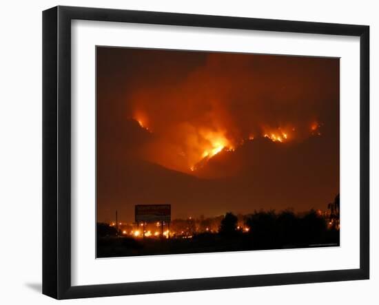 A Wildfire Can be Seen Raging in the Hills Over the Town of St. Ignatius, Montana-null-Framed Photographic Print