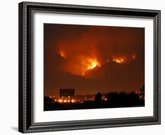 A Wildfire Can be Seen Raging in the Hills Over the Town of St. Ignatius, Montana-null-Framed Photographic Print