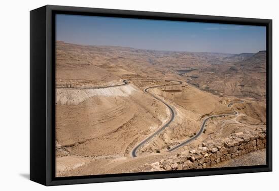 A winding road through the rocky mountains, Jordan, Middle East-Francesco Fanti-Framed Premier Image Canvas