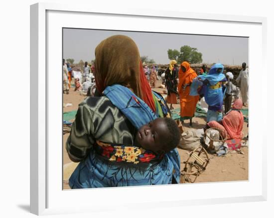 A Woman Carries Her Son-null-Framed Photographic Print