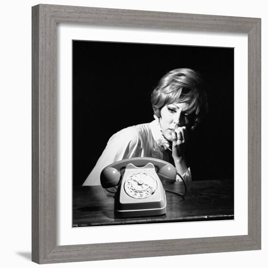 A Woman Looking at a Phone-Marisa Rastellini-Framed Photographic Print