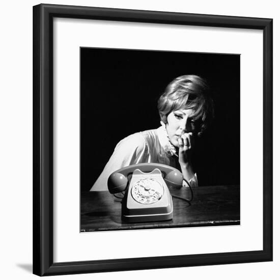 A Woman Looking at a Phone-Marisa Rastellini-Framed Photographic Print