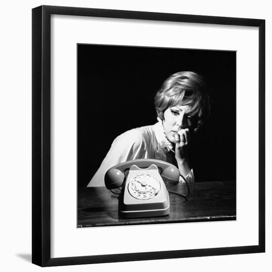 A Woman Looking at a Phone-Marisa Rastellini-Framed Photographic Print