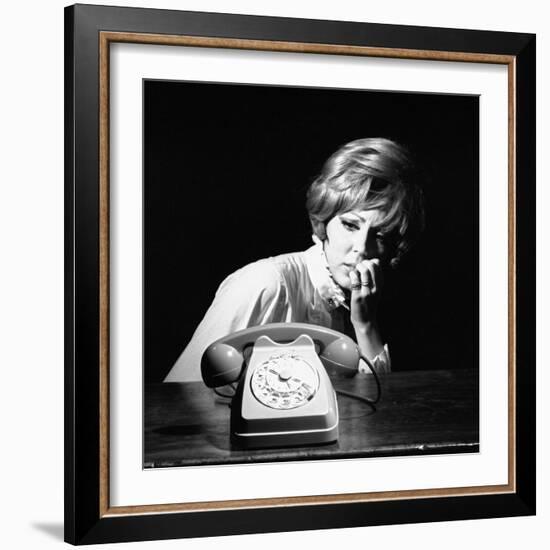 A Woman Looking at a Phone-Marisa Rastellini-Framed Photographic Print