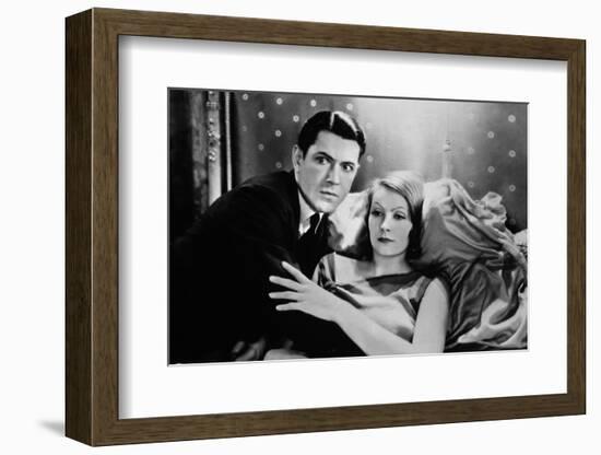 A WOMAN OF AFFAIRS, 1929 directed by CLARENCE BROWN with John Mack Brown / Greta Garbo (b/w photo)-null-Framed Photo