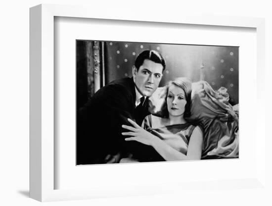 A WOMAN OF AFFAIRS, 1929 directed by CLARENCE BROWN with John Mack Brown / Greta Garbo (b/w photo)-null-Framed Photo