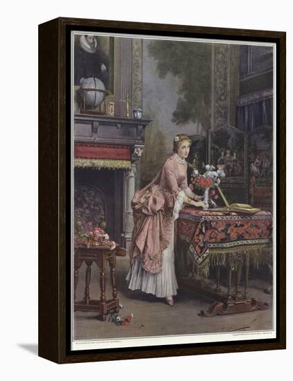 A Woman Placing a Vase of Flowers on a Table-Emile Pierre Metzmacher-Framed Premier Image Canvas