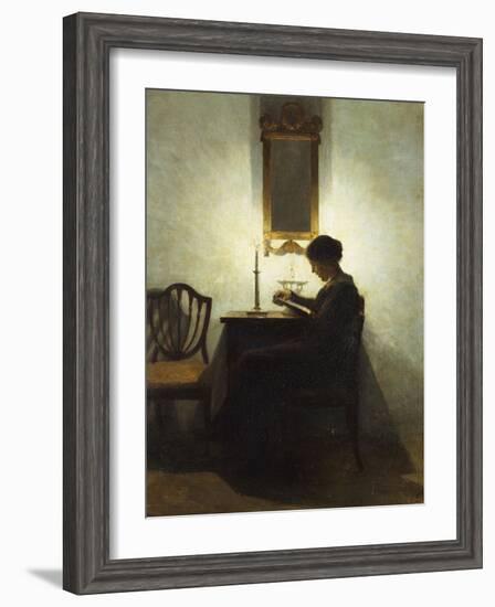 A Woman Reading by Candlelight in an Interior-Peter Ilsted-Framed Giclee Print