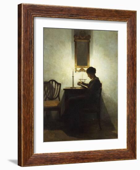 A Woman Reading by Candlelight in an Interior-Peter Ilsted-Framed Giclee Print