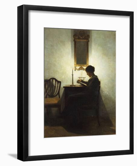 A Woman Reading by Candlelight in an Interior-Peter Ilsted-Framed Giclee Print