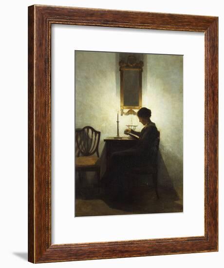 A Woman Reading by Candlelight in an Interior-Peter Ilsted-Framed Giclee Print