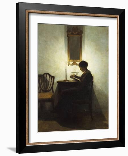 A Woman Reading by Candlelight in an Interior-Peter Ilsted-Framed Giclee Print