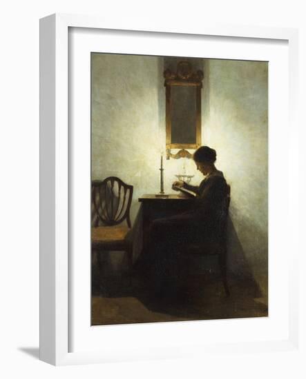 A Woman Reading by Candlelight in an Interior-Peter Ilsted-Framed Giclee Print