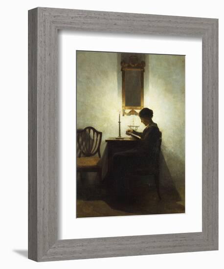 A Woman Reading by Candlelight in an Interior-Peter Ilsted-Framed Giclee Print