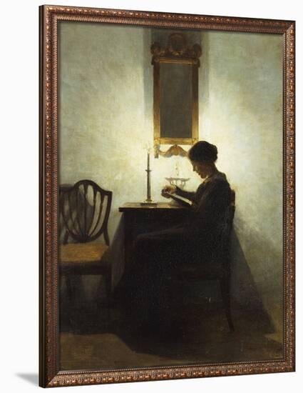 A Woman Reading by Candlelight in an Interior-Peter Ilsted-Framed Giclee Print