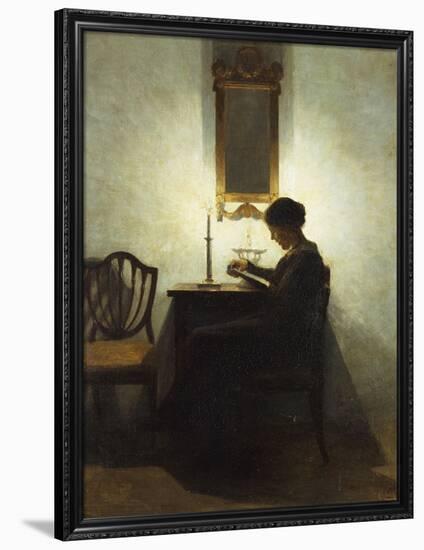 A Woman Reading by Candlelight in an Interior-Peter Ilsted-Framed Giclee Print