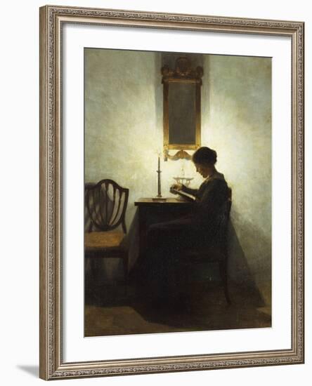 A Woman Reading by Candlelight in an Interior-Peter Ilsted-Framed Giclee Print