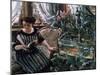 A Woman Reading Near a Goldfish Tank-Lovis Corinth-Mounted Giclee Print