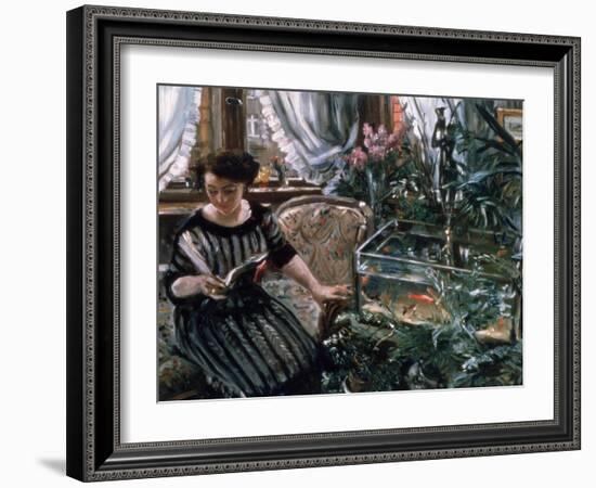 A Woman Reading Near a Goldfish Tank-Lovis Corinth-Framed Giclee Print