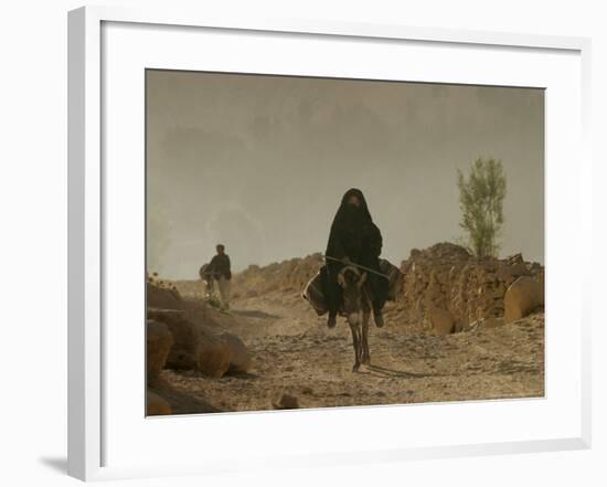 A Woman Rides a Donkey in Bamiyan Province, Central Afghanistan, September 16, 2005-Tomas Munita-Framed Photographic Print