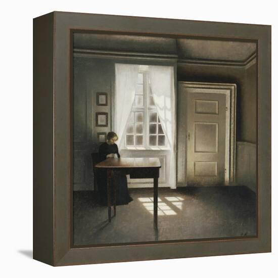 A Woman Sewing in an Interior-Vilhelm Hammershoi-Framed Premier Image Canvas