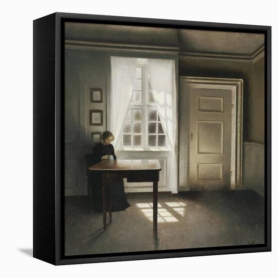 A Woman Sewing in an Interior-Vilhelm Hammershoi-Framed Premier Image Canvas