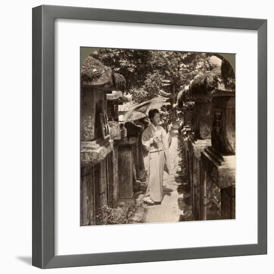 A Woman Shinto Devotee Counting the Stone Lanterns, Kasuga Shrine, Nara, Japan, 1904-Underwood & Underwood-Framed Photographic Print