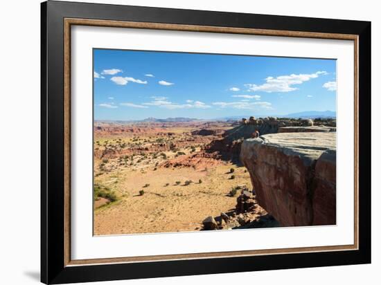 A Woman Sits While Enjoying The View At A San Rafael Swell Overlook, Utah-Ben Herndon-Framed Photographic Print
