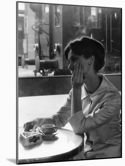 A Woman Sitting Thoughtful at the Bar of a Railway Station-Marisa Rastellini-Mounted Photographic Print