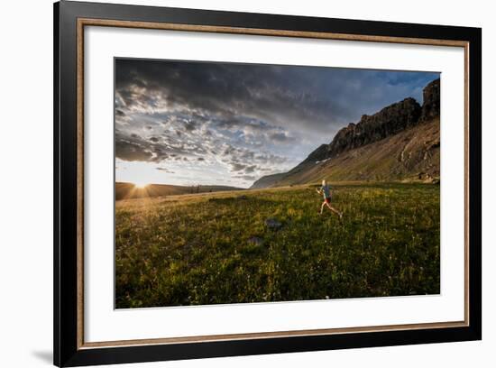 A Woman Trail Running in Glacier National Park, Montana-Steven Gnam-Framed Photographic Print