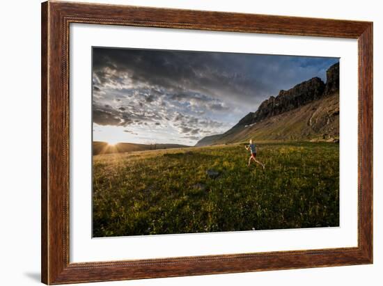 A Woman Trail Running in Glacier National Park, Montana-Steven Gnam-Framed Photographic Print
